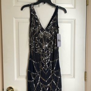 Navy blue dress with sequins.  Womens size 8.  NWT.